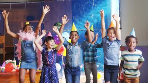 Enthusiastic Children Celebrate Birthday Party Indoors