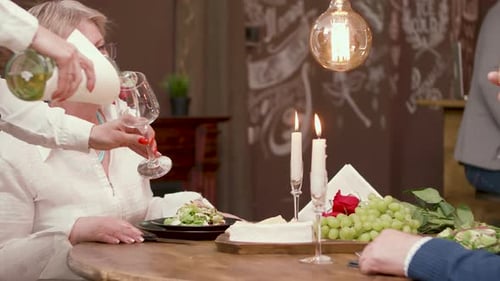 Wine Pour at Candlelit Restaurant Dinner