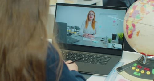 Child Girl Kid Schoolgirl with Teacher Using Tablet Laptop Computer for Writing School Homework