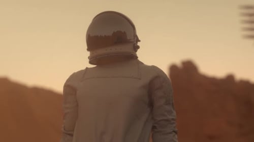 Astronaut on the Planet Mars at Sunset