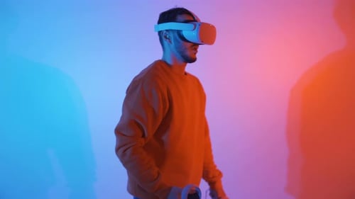 Front View of a Man Wearing a VR Virtual Headset, in a Fighting Pose