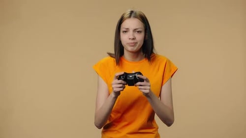Woman Plays Video Game and Reacts to Winning