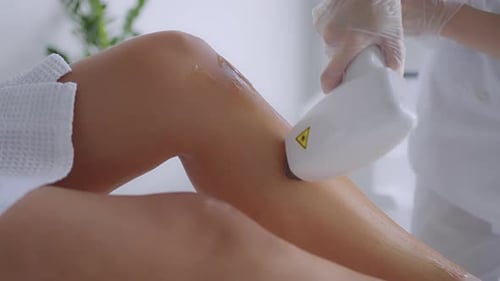 Laser Hair Removal Treatment on Woman's Leg