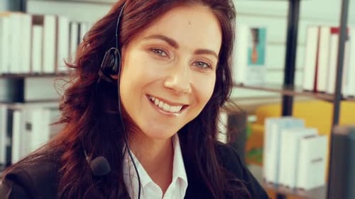 Business People Wearing Headset Working in Office