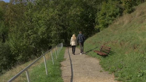Couple walking on an alley