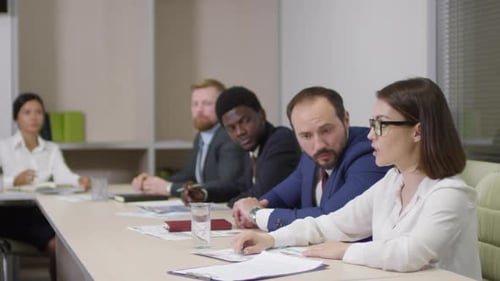 Business Meeting Around a Conference Table