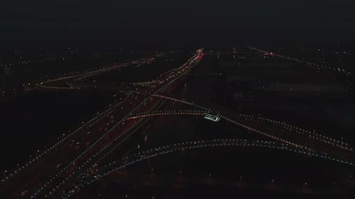 Aerial Top View of Highway Interchange at Night
