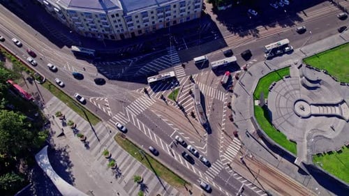 Traffic Crossing Busy Intersection at City