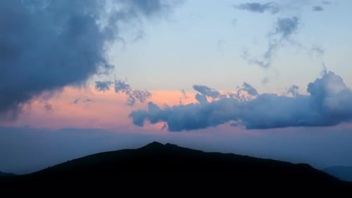Time lapse of Red Sunset Sky with Clouds in Bulgaria Mountains