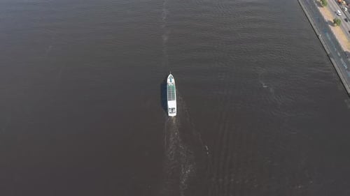 Pleasure Boat Sails On The River