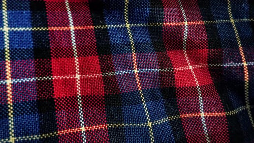 Red and Blue Plaid Fabric Texture Gently Waving Loop Background