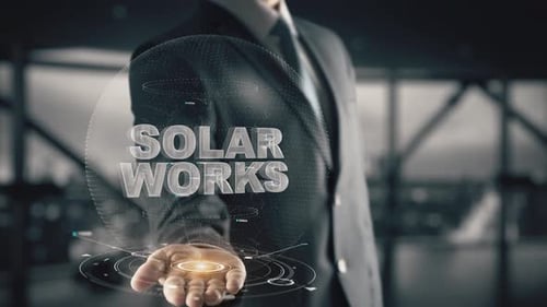 Businessman with Solar Works Hologram Concept