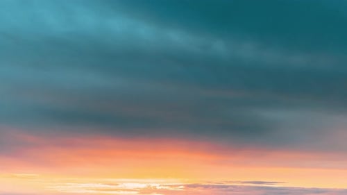 Vivid Colorful Sunset with Layered Clouds