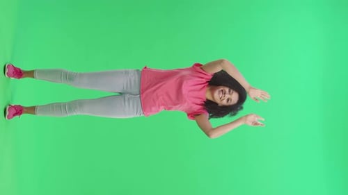 Woman Framing With Arms on Green Screen
