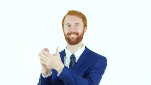Man in Suit Clapping in Studio