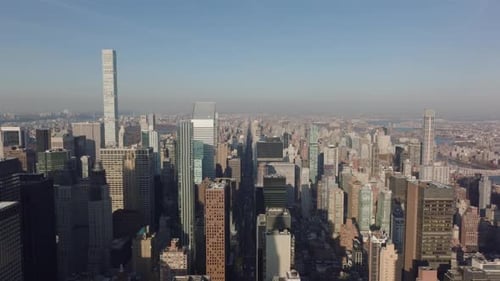 Aerial View of High Rise Office Buildings Lit By Afternoon Sun