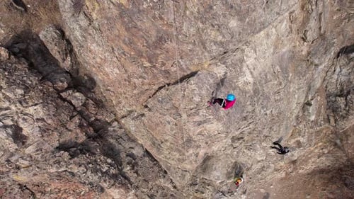 Rock Climbing Training on Steep Slope in Mountains