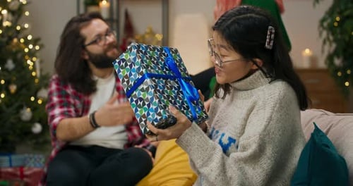 Woman Receives Christmas Gift with Joy