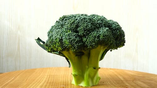 Fresh Green Broccoli on Wooden Table Still Life