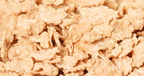 Crispy Golden Corn Flakes Piled in Close-Up