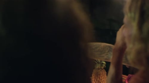 Friends Toasting Drinks at Evening Celebration