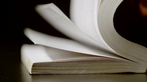 Book Pages Turning Quickly in Close Up