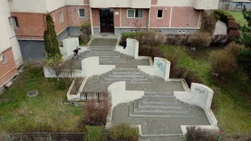 Young Man Doing Parkour in Urban Setting