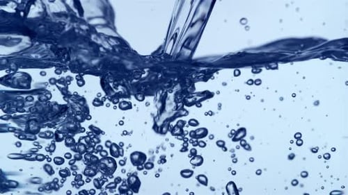 Pouring Liquid Creates Splashing Bubbles