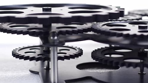 Rotating Metal Gears in Abstract Close Up