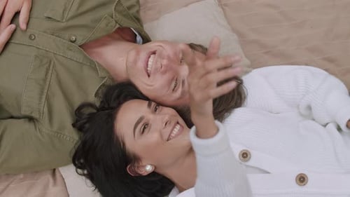 Happy Couple Smiling Lying Together Indoors