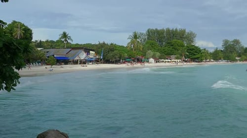 White Sandy Beach and Boats in Sea