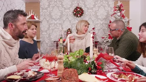 Family Holiday Dinner Celebration in a Decorated Home