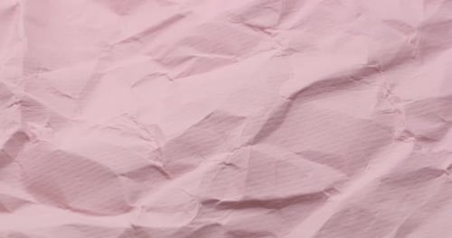 Abstract Crumpled Pink Paper Texture Close Up
