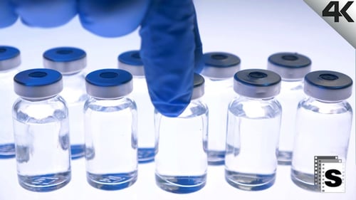 Glass Vials of Medicine in a Lab