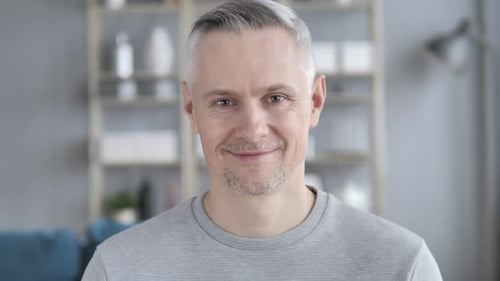 Smiling Man with Gray Hair Close Up Portrait