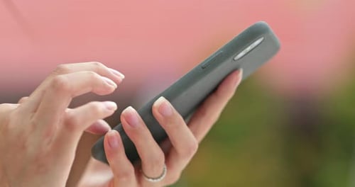 Woman Use of Mobile Phone, Close Up