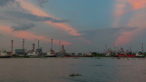 Petroleum Refinery at Sunrise on the Water