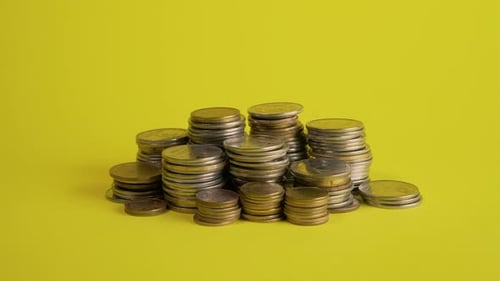 Accumulating Stacks of Gold and Silver Coins