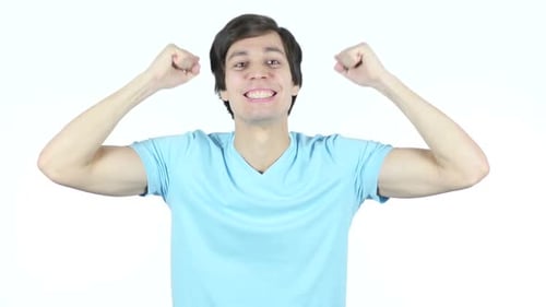 Man Celebrates with Fists Pumped in the Air