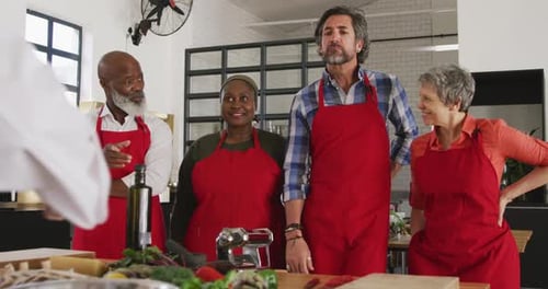 Cooking Lesson with a Group in a Kitchen