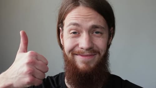 Bearded Man Giving a Thumbs Up Sign