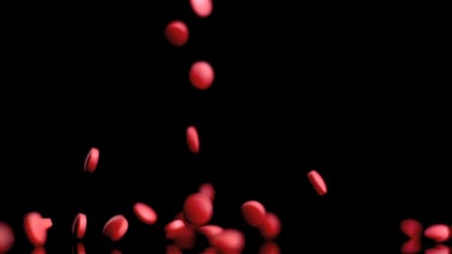 Animated Red Pills Falling on Reflective Black Surface