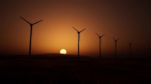 Wind Turbines At Sunset
