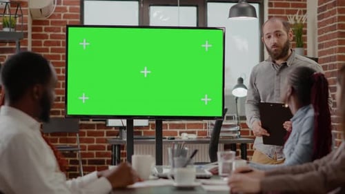Workmates Using Monitor with Mockup Green Screen