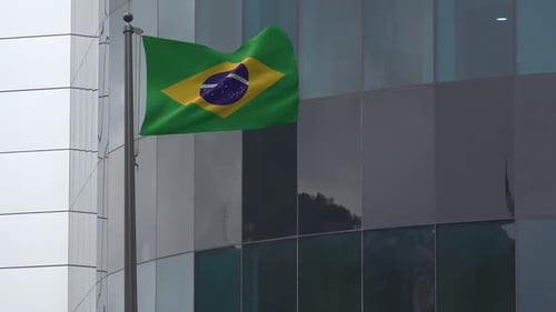 Brazilian National Flag Waving Realistically Against Modern Building