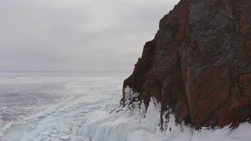 Aerial View of Winter Landscape of Rocky Mountains on Lake Baikal