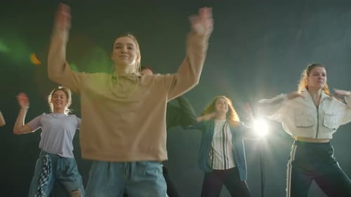 Group of Young Adults Dancing in Studio