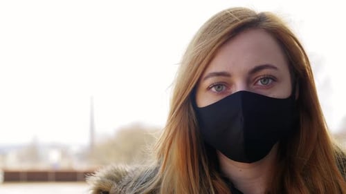 Young Woman Wearing Face Mask Outdoors