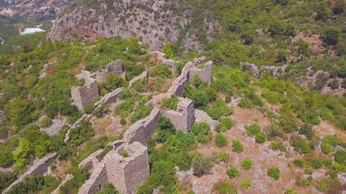 Top view of ancient ruins of castle on a hill