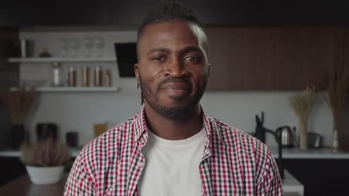 Smiling Man in Kitchen Close Up Portrait